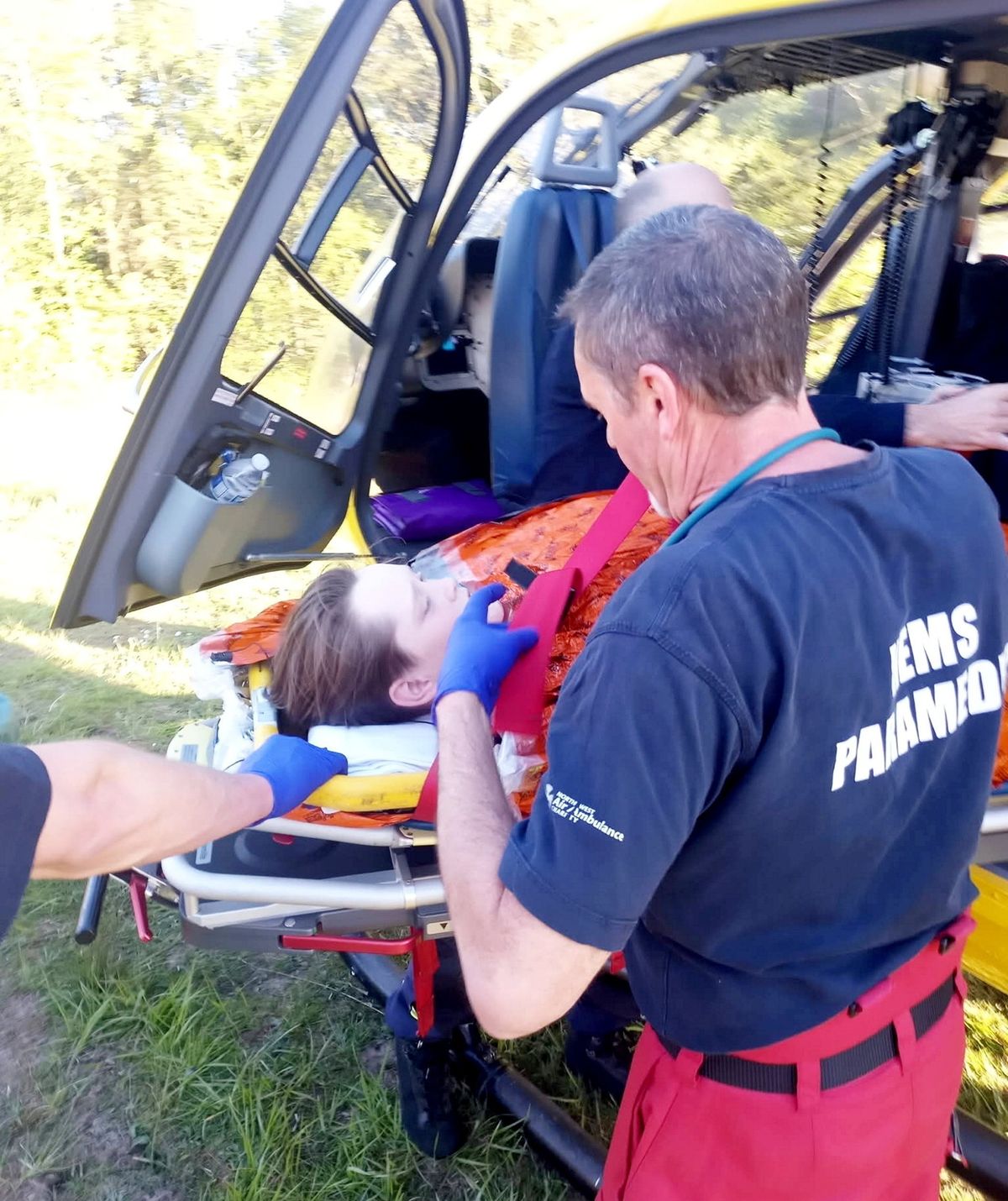 Jacob Butler, 14, being transfered into the air ambulance