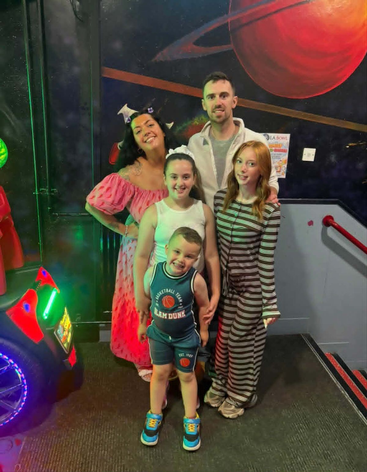 John, Jorja 15, Paris-Cole, eight, and Clay-Ty, four, and wife Nicole, 29