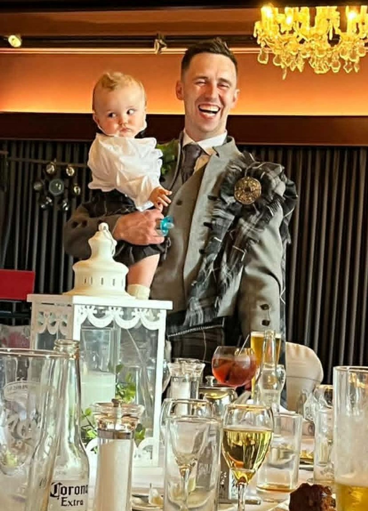 John and his beloved son on his wedding day in 2022