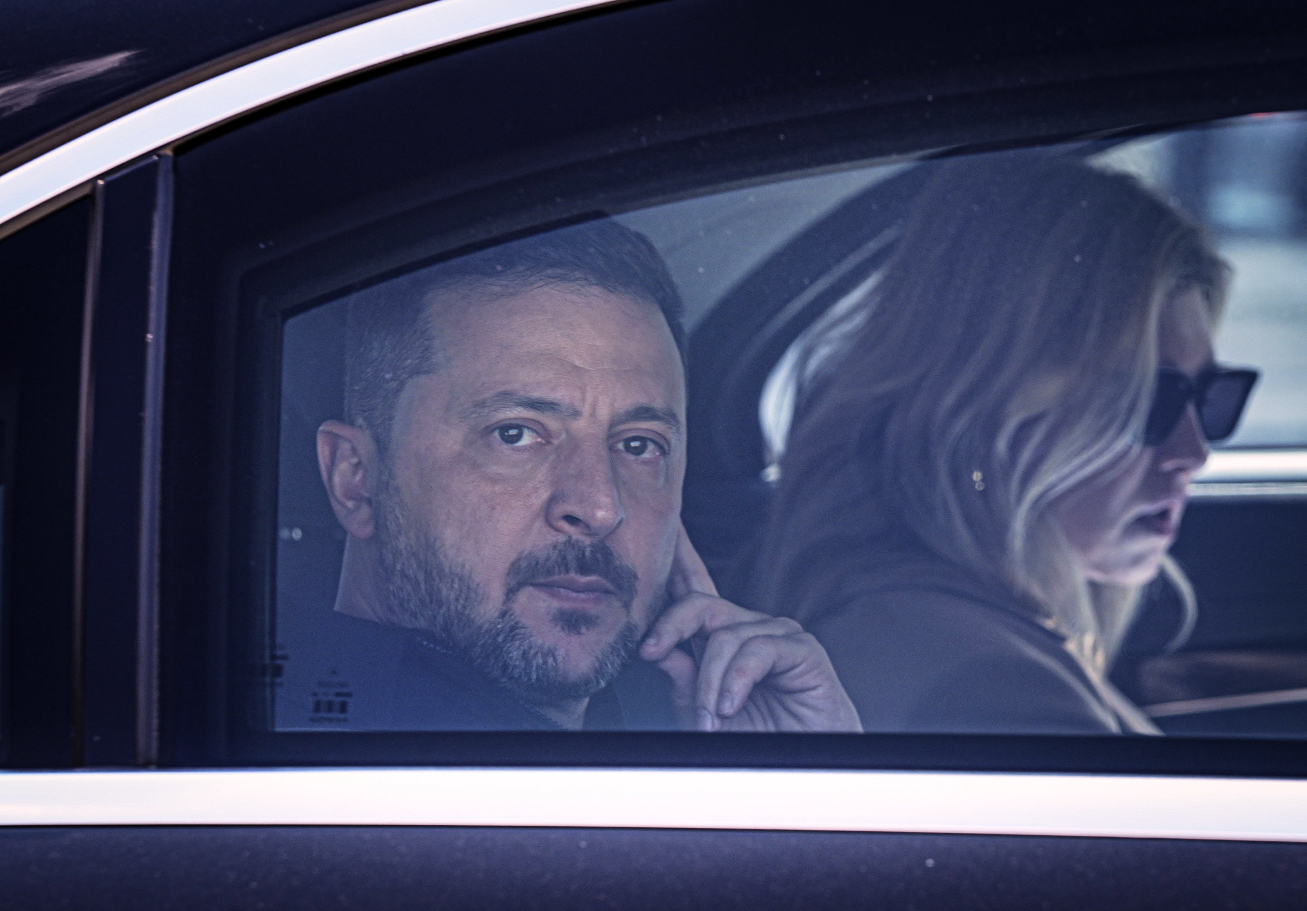 Ukraine's President Volodymyr Zelenskyy looks out from his car window as he arrives for the NATO Summit in Ankara, Turkey, Tuesday, July 7, 2026.