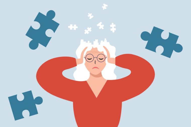 Frustrated elderly woman suffers from migraine, confusion, memory loss, dementia. Brain puzzle. Alzheimer's or Parkinson symptoms. Healthcare and medicine concept.