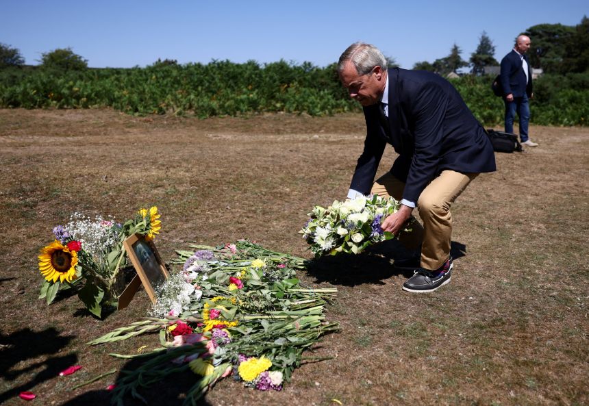 Leader of the Reform UK party Nigel Farage lays flowers at Dartmoor National Park near the home of former government minister and Reform UK party member Ann Widdecombe, in Haytor, Britain, on July 11, 2026.