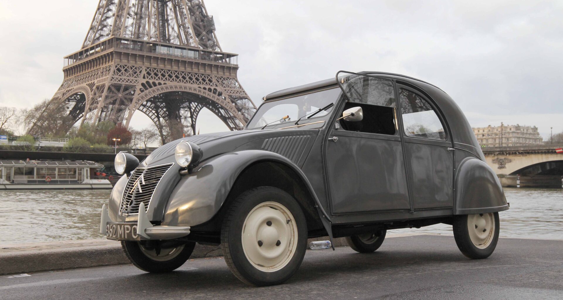 Vintage 1954 Citroen 2CV car on display showcasing classic French automotive design and innovation