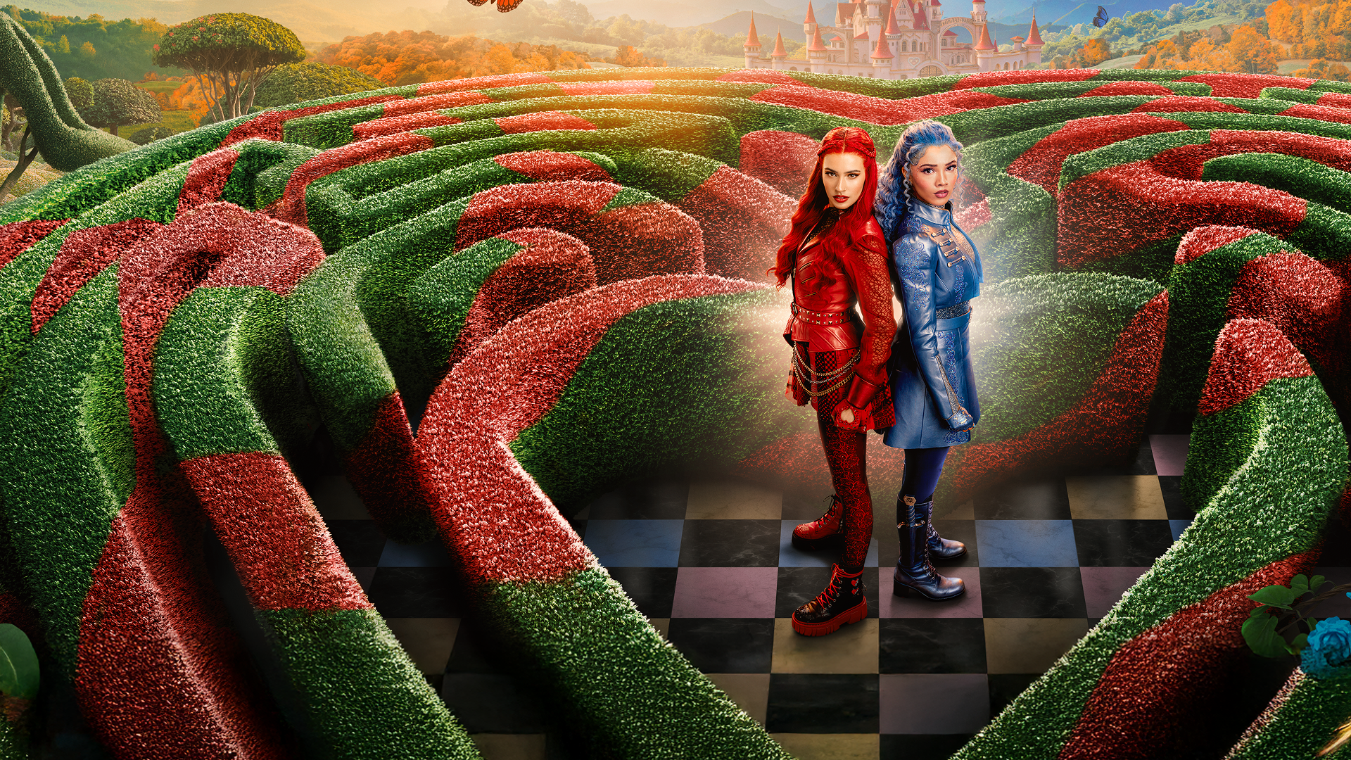 Red (Kylie Cantrall) and Chloe (Malia Baker) stand amidst a heart-shaped hedge maze in Wonderland.