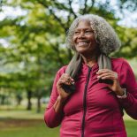 Elderly woman exercising in a public park