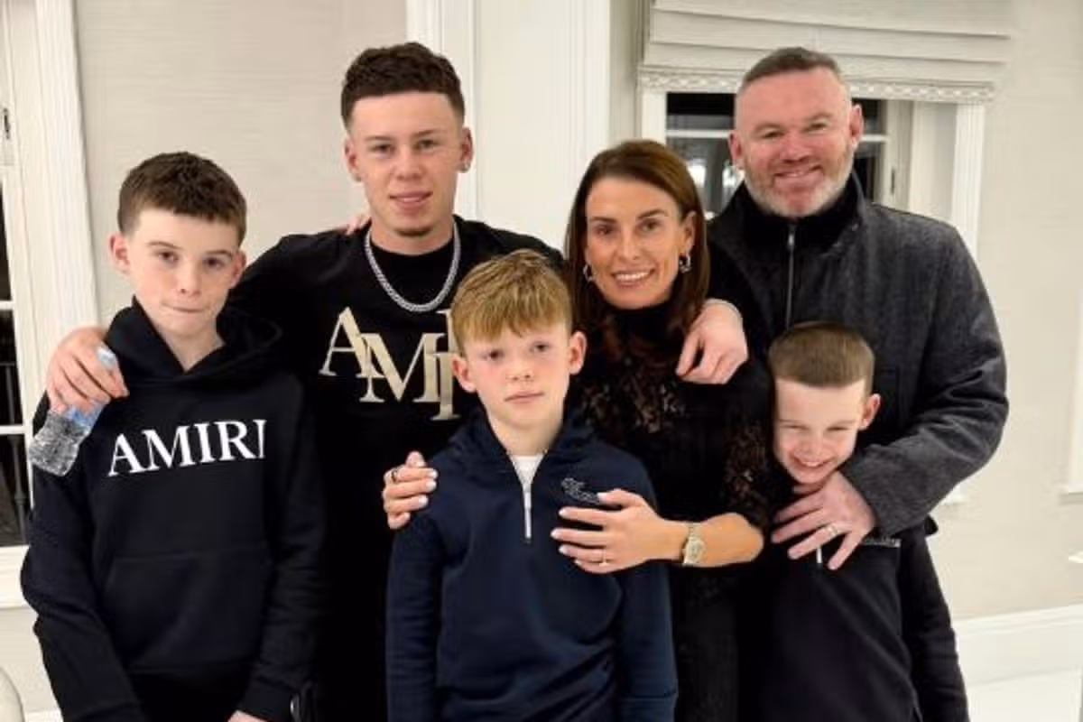 Coleen and Wayne Rooney with their children