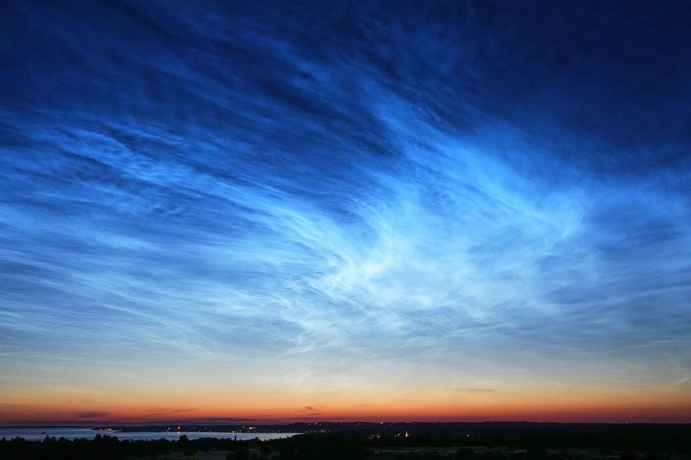 Strange ‘Space Clouds’ Seen Glowing Across Northern Hemisphere