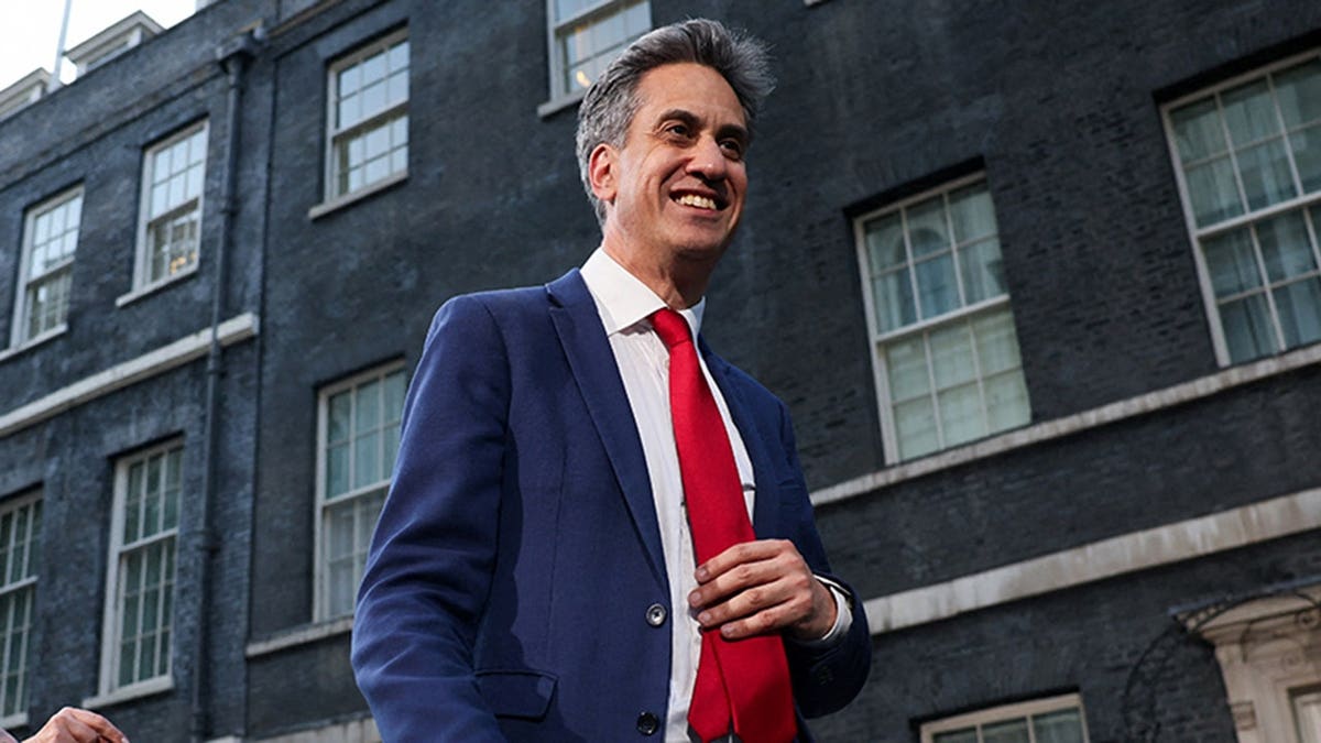 A journalist asks a question to Britain's newly appointed Foreign Secretary Ed Miliband on Downing Street after Britain's newly appointed Prime Minister Andy Burnham took office, in London, Britain, July 20, 2026. REUTERS/Jack Taylor TPX IMAGES OF THE DAY