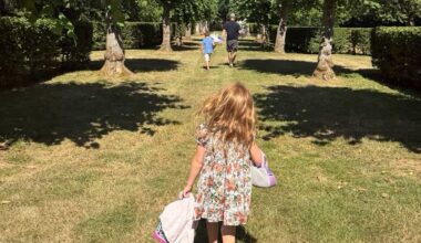 Princess Lilibet and Prince Archie carry flowers to Princess Diana's grave in new photograph