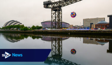 Charles Rennie Mackintosh-inspired Commonwealth Games artwork hung from Finnieston Crane