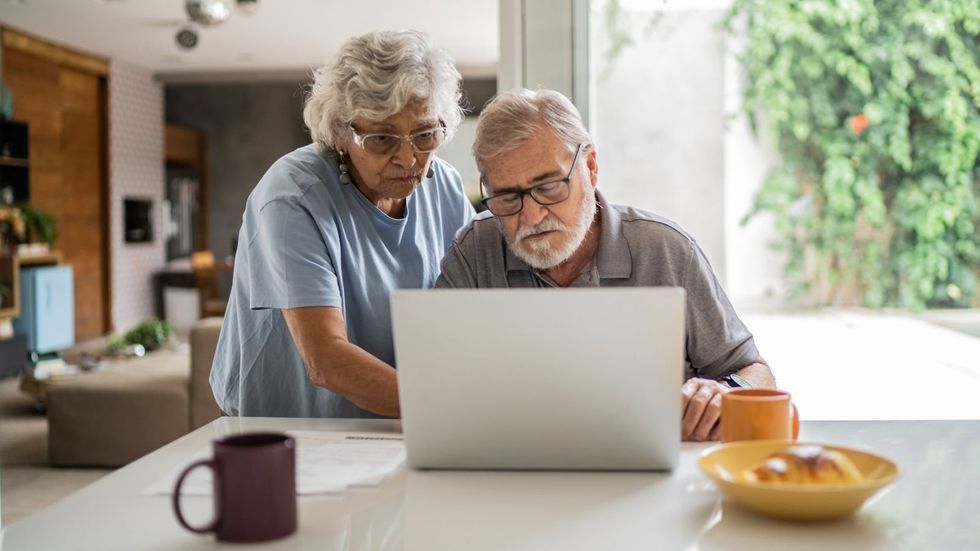 Couple at laptop