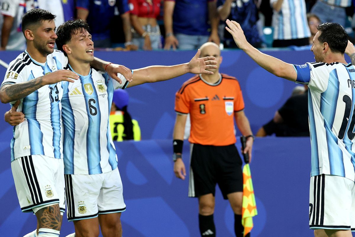 Lisandro Martinez #6 of Argentina celebrates scoring his team's second goal with teammates Cristian Romero and Lionel Messi during the FIFA World Cup 2026 Round Of 32 match between Argentina and Cabo Verde 