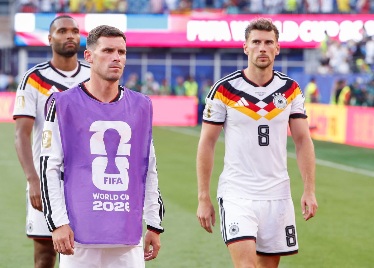 Pascal Gross #13, Leon Goretzka #8 of Germany look dejected following the FIFA World Cup 2026 Round Of 32 match between Germany and Paraguay