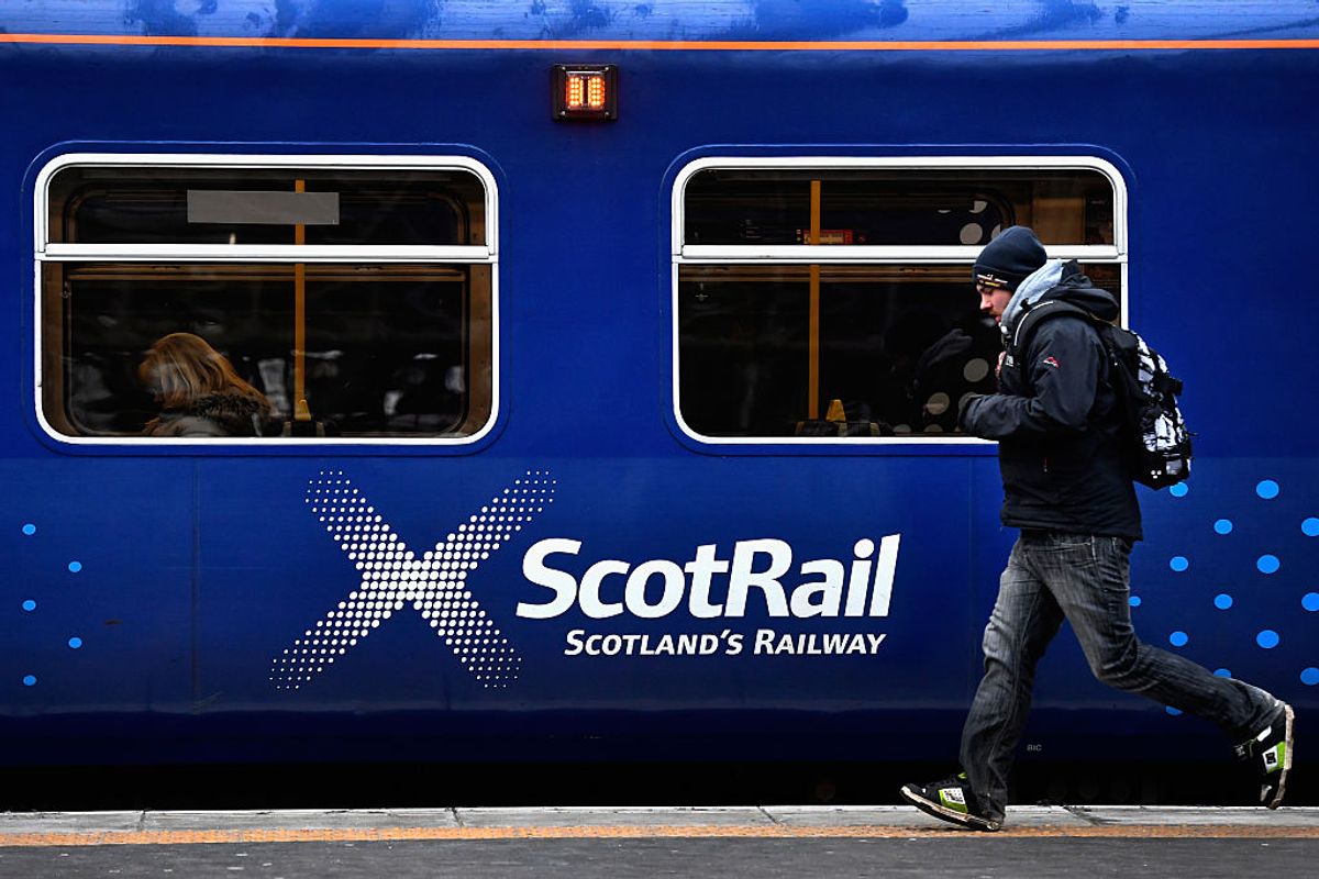 ScotRail trains operated by Abellio arrive and depart for Glasgow Central station