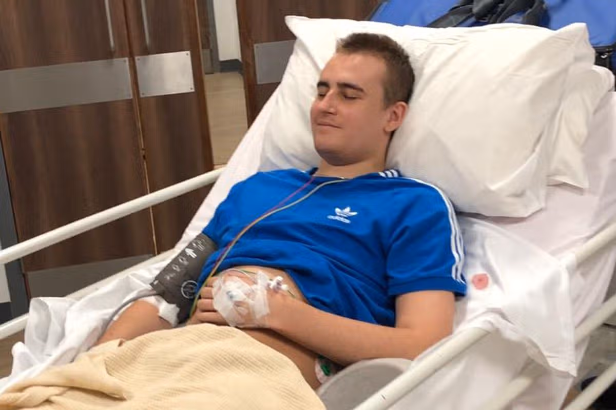 Thomas in a hospital bed, after a seizure he had during the night as an inpatient