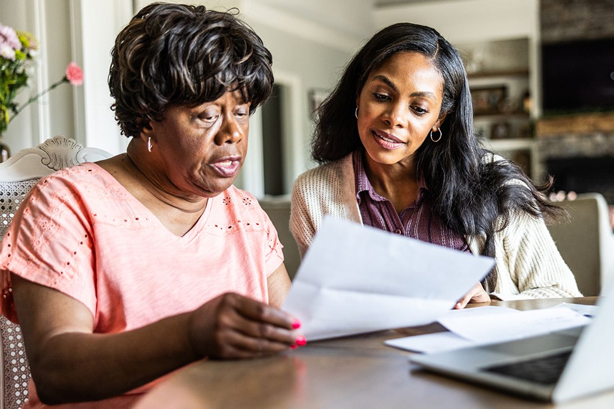 A woman checks her finances