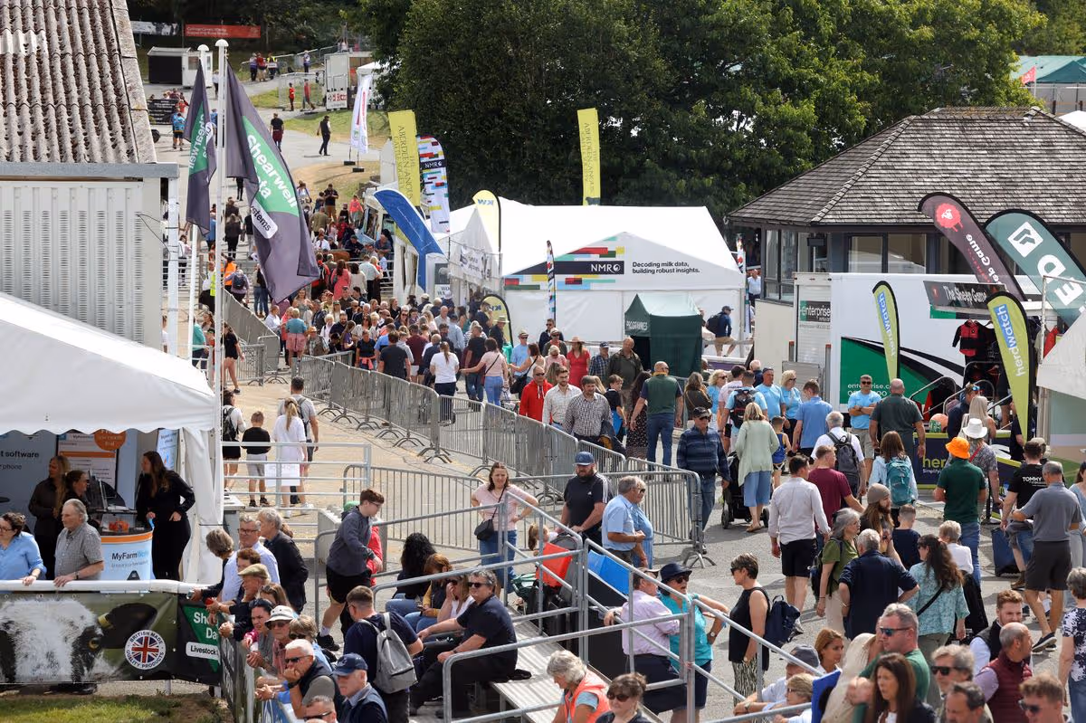 Crowds of people at an agricultural show 
