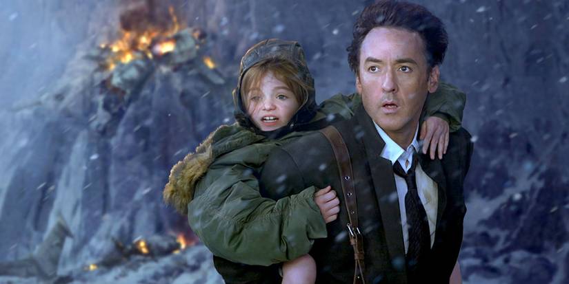Jackson Curtis (John Cusack) holds his daughter Lilly (Morgan Lily) as the world ends in '2012'