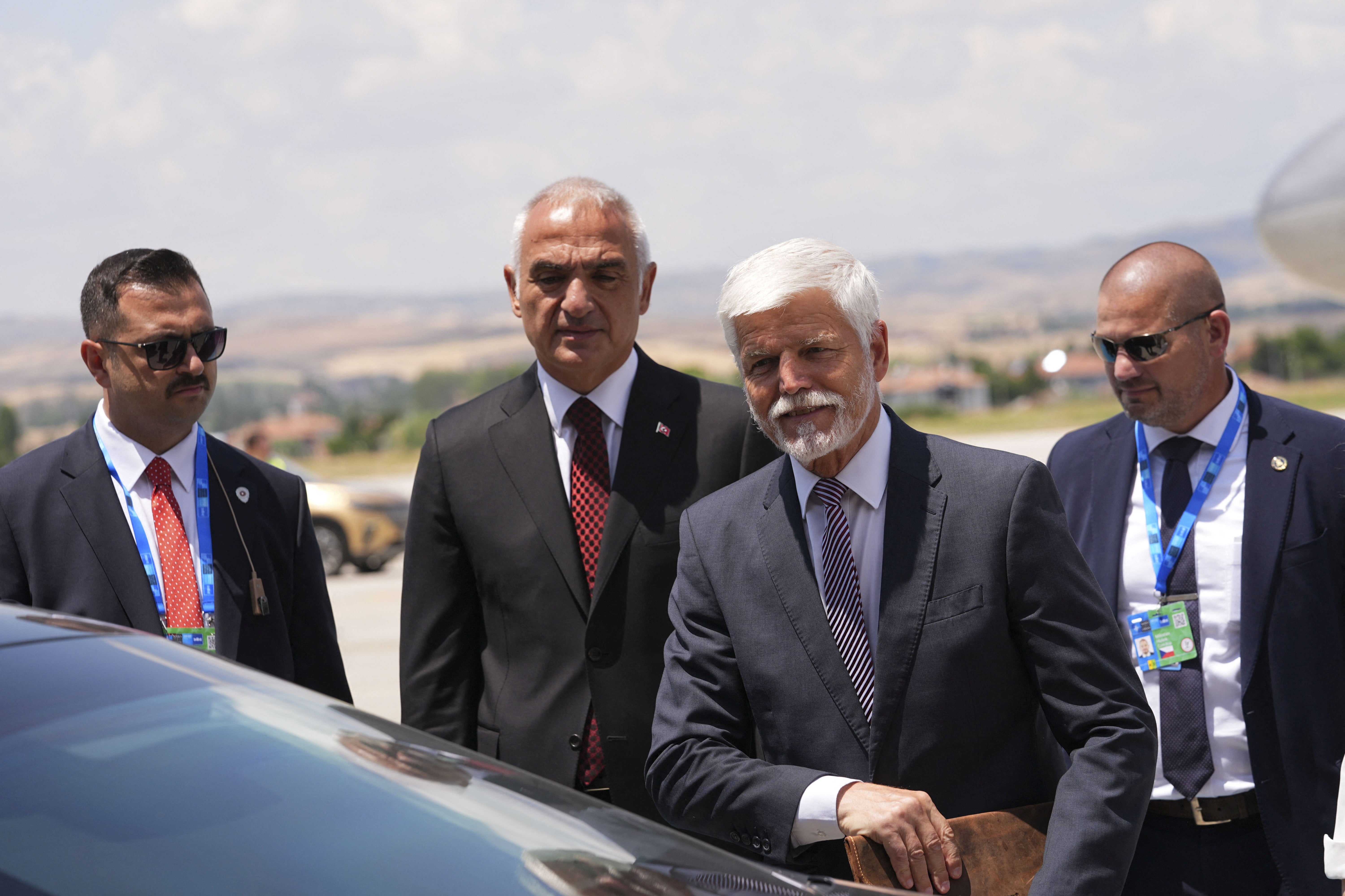 Czech president Petr Pavel is welcomed by the Turkish minister of Culture and Tourism Mehmet Nuri Ersoy at Esenboga Airport in Ankara