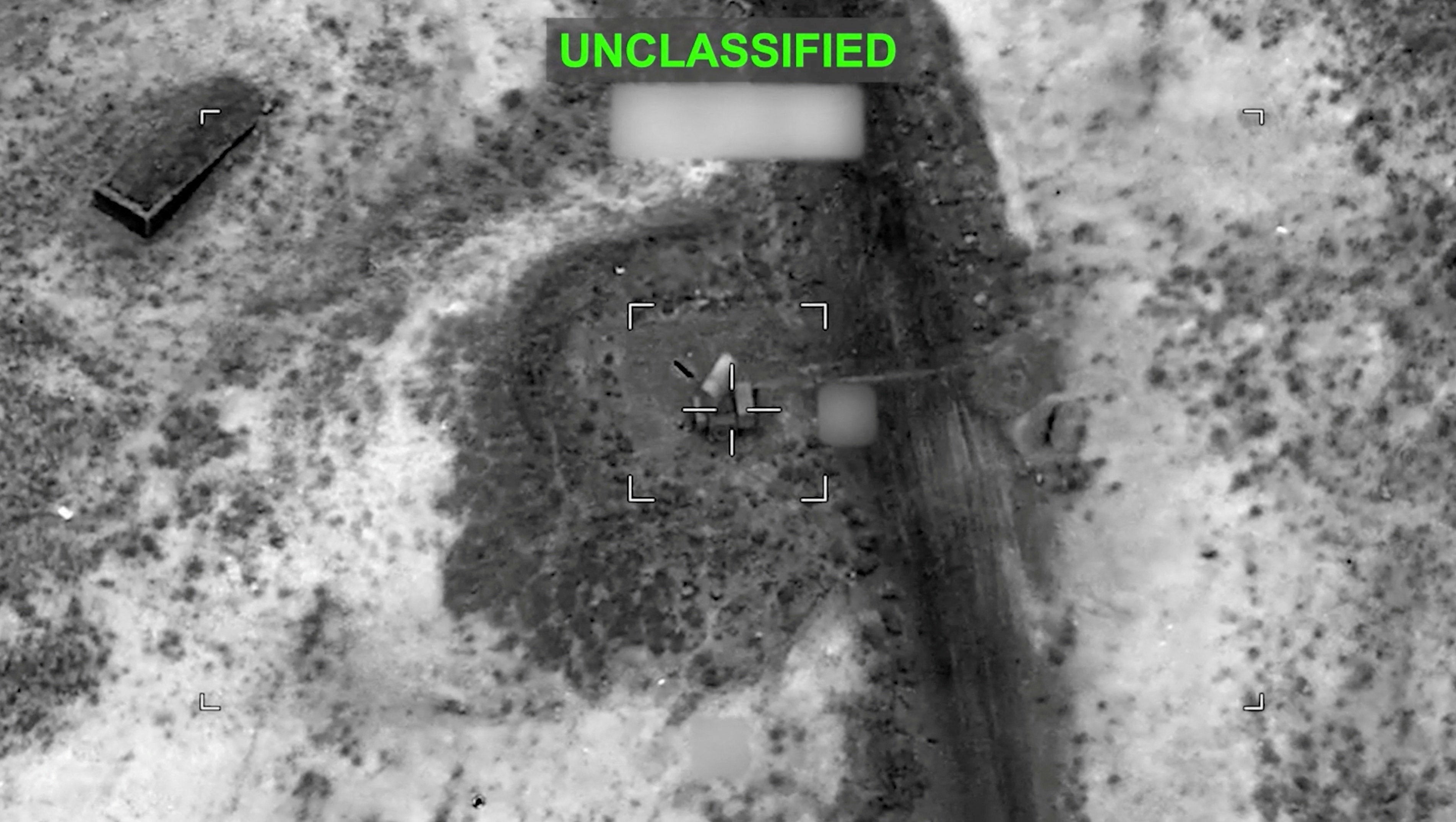 A projectile approaches a target at an unknown location, during what U.S. Central Command (CENTCOM) says are strikes on Iran, in this screen grab taken from a handout video released on July 12, 2026