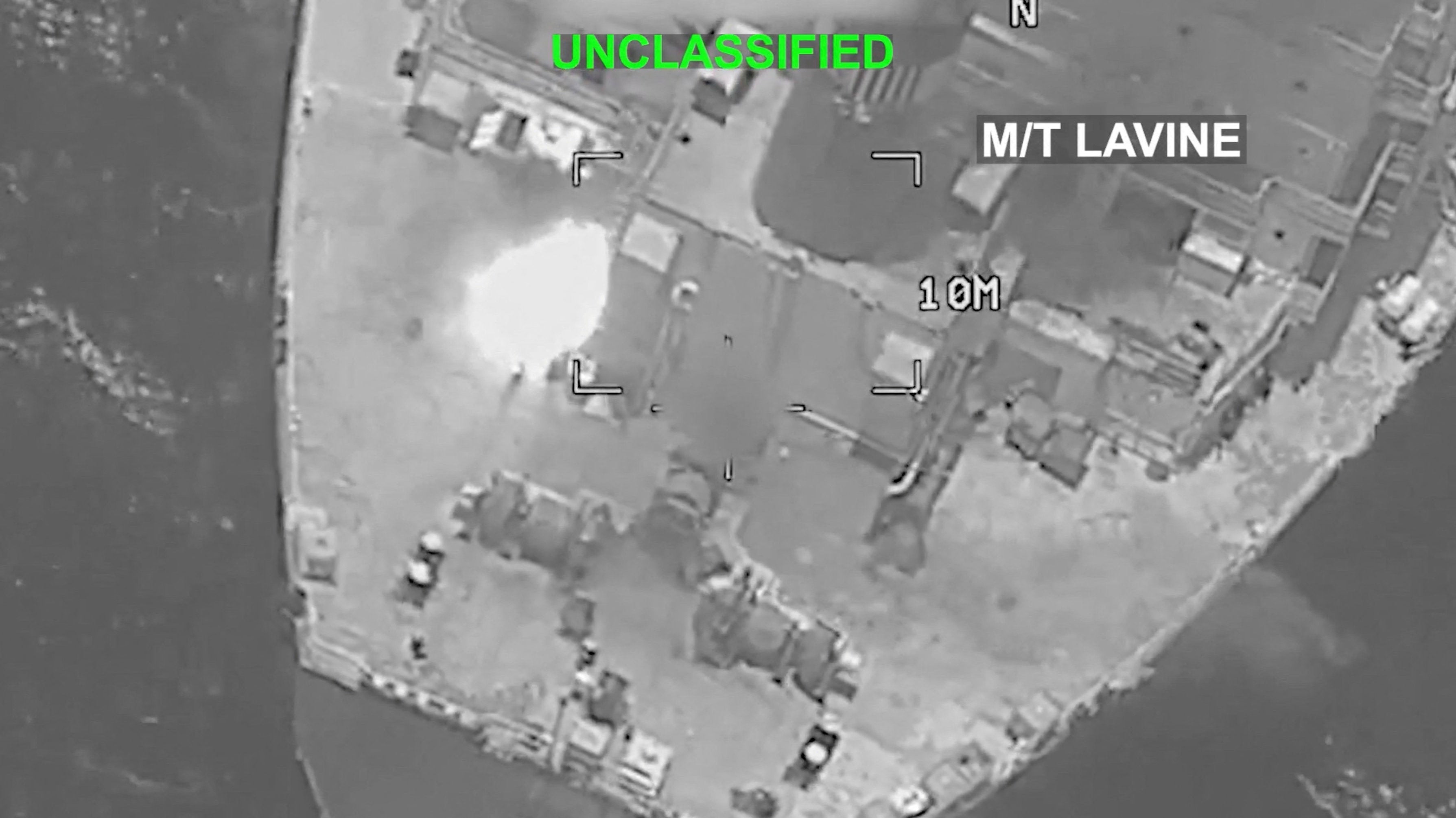 A bright flash is visible on the deck of the Mozambique-flagged tanker M/T Lavine in a location given as the Gulf of Oman in this screengrab obtained from a video released by US Central Command on 25 July 2026