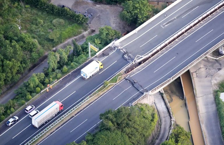 An aerial view shows the damaged Kyushu Expressway after the earthquake in Yatsushiro, Kumamoto prefecture [Kyodo via Reuters]