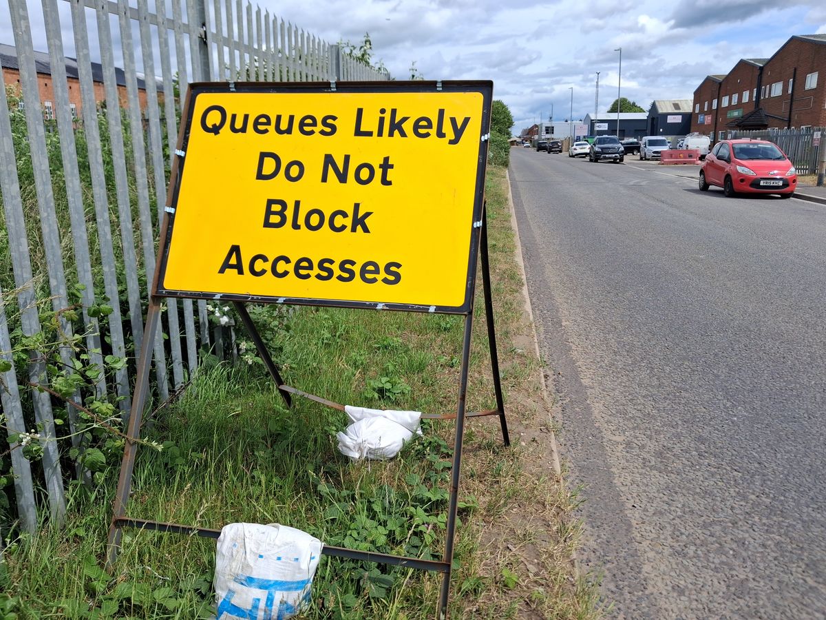 Signs warn 'queues likely' around Lincoln's recycling centre on Great Northern Terrace