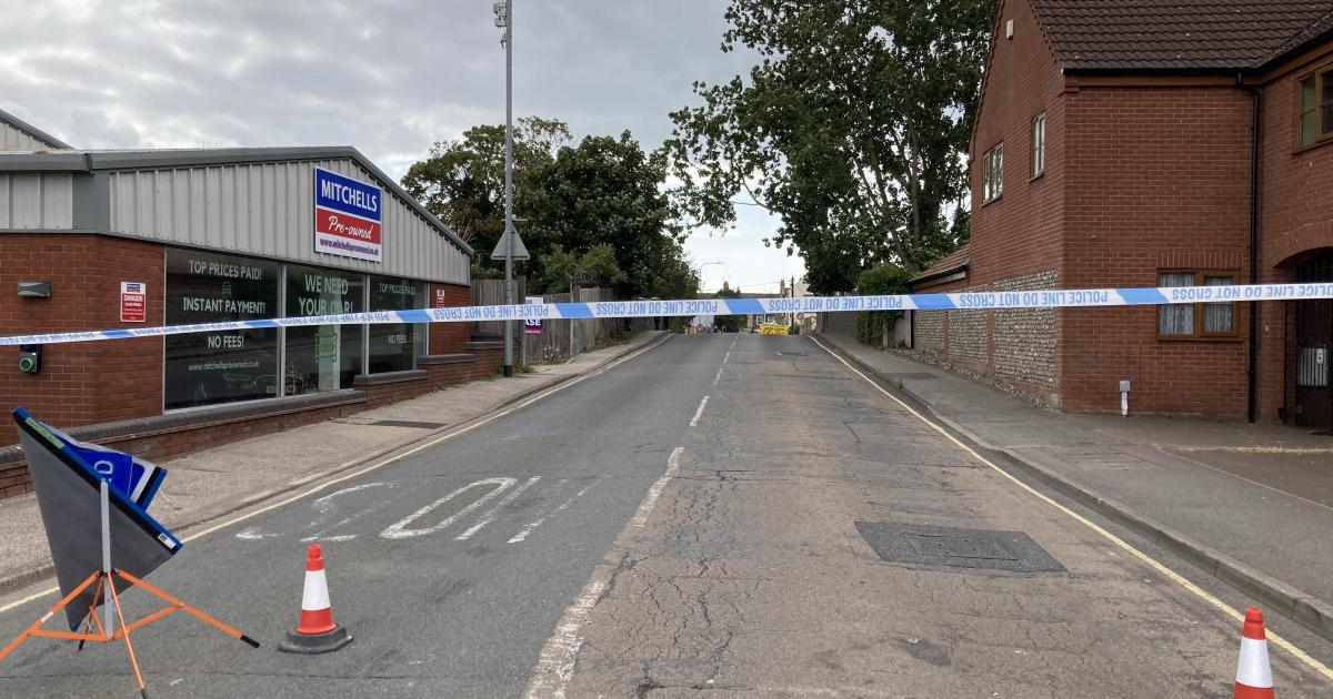 Two Lowestoft roads closed after man climbs onto roof