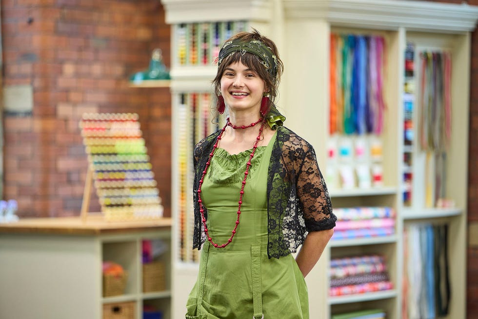 Anna contestant in The Great British Sewing Bee S12 2026 anna contestant in the great british sewing bee s12 2026 in green and black outfit