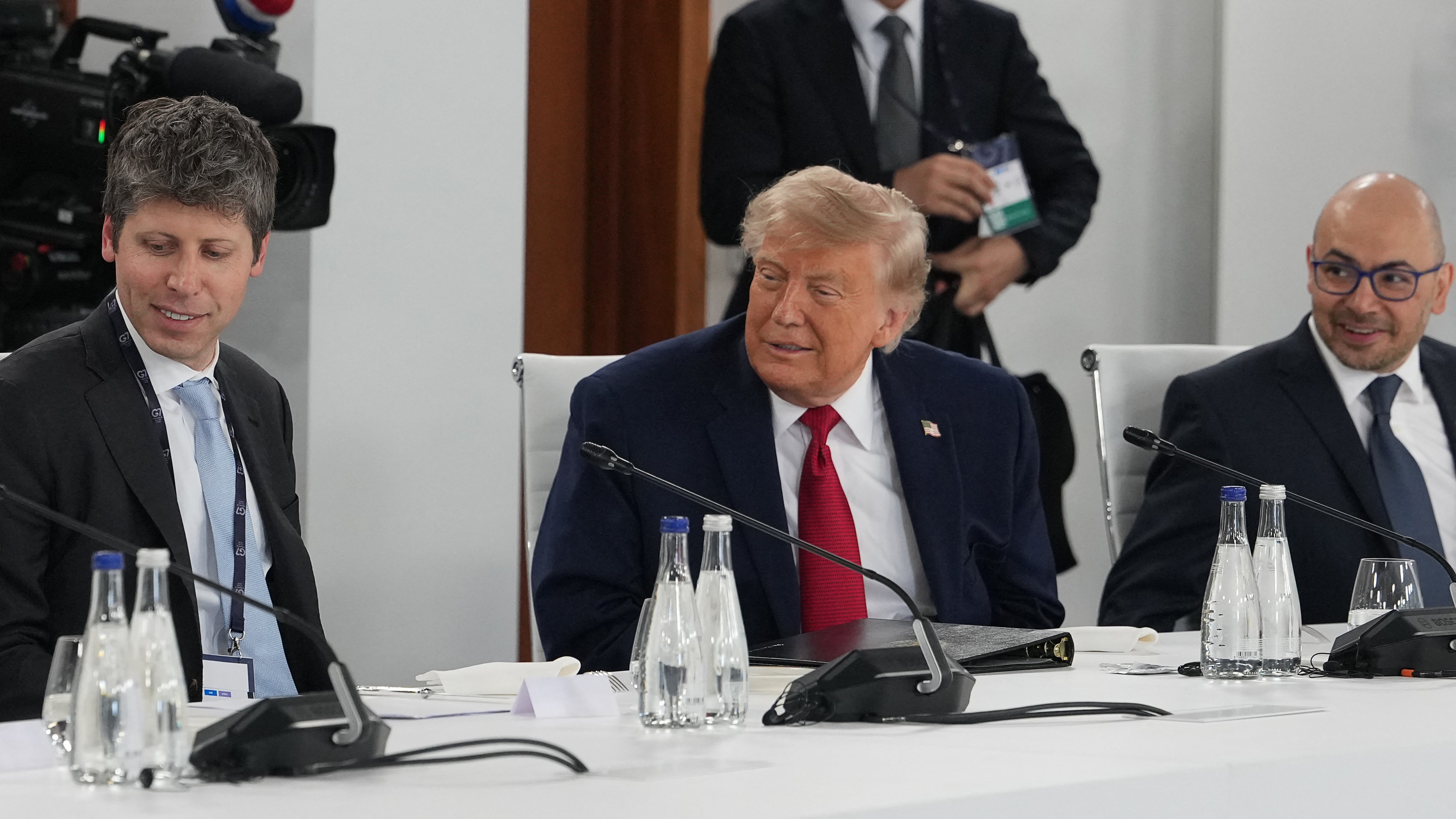 Trump flanked by OpenAI’s CEO Sam Altman, left, and Google DeepMind’s Demis Hassabis at the G7