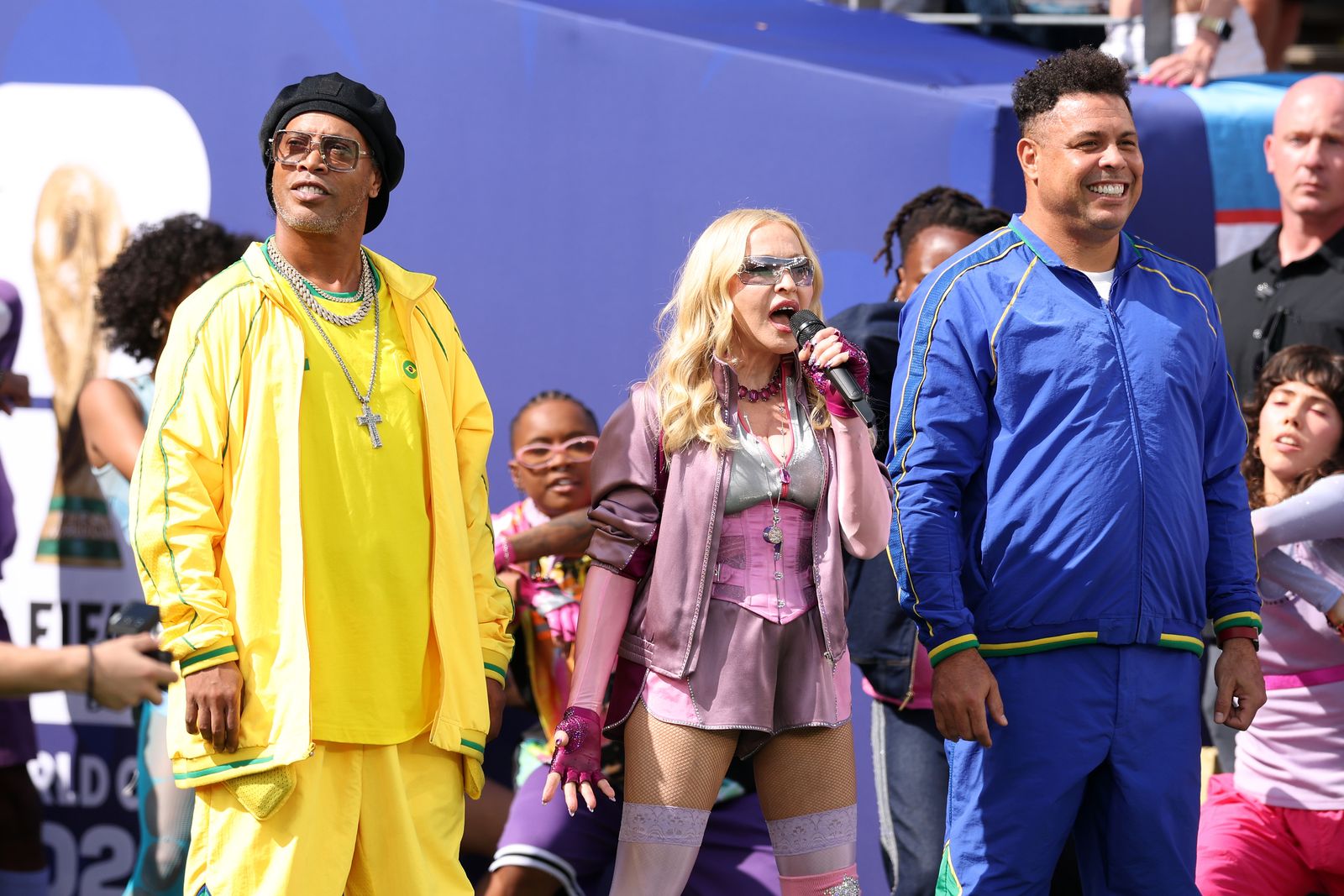 EAST RUTHERFORD NEW JERSEY JULY 19 Ronaldinho Madonna and Ronaldo perform during the Topps Final Halftime Show in the...