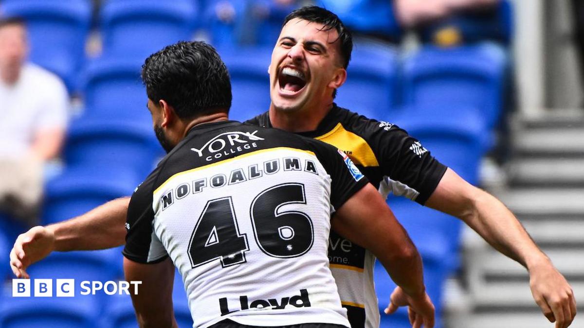 Cody Hunter of York Knights celebrating his try with team-mate David Nofoaluma.