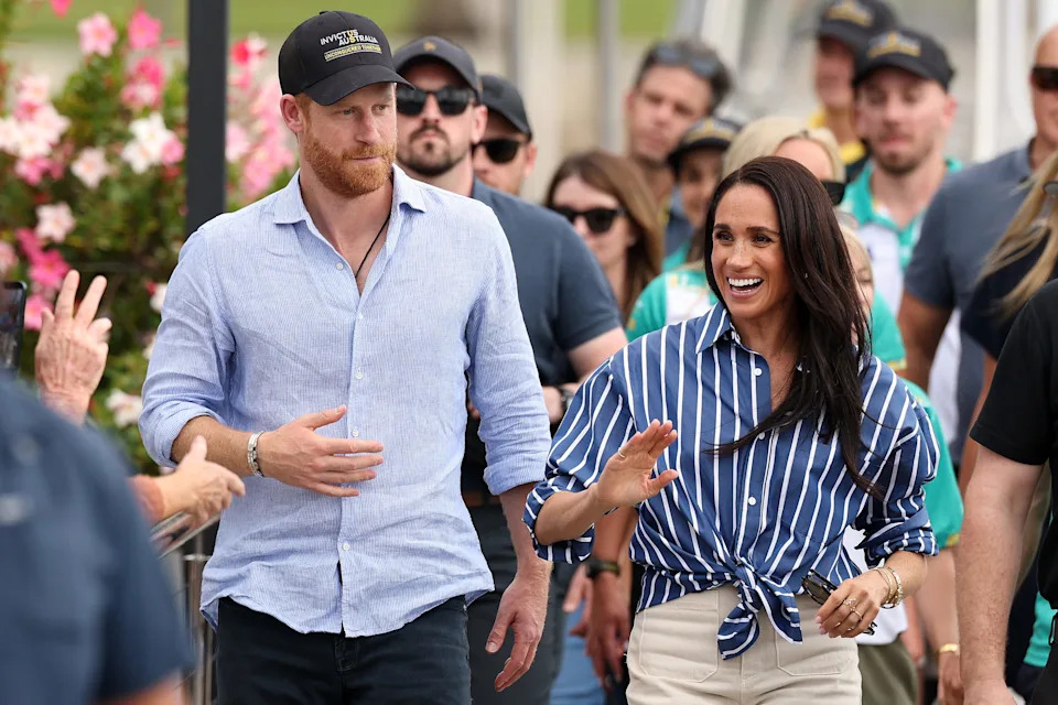 Prince Harry, Duke of Sussex, and Meghan, Duchess of Sussex, greet members of the public at the Cruising Yacht Club of Australia on April 17, 2026, in Sydney, Australia.