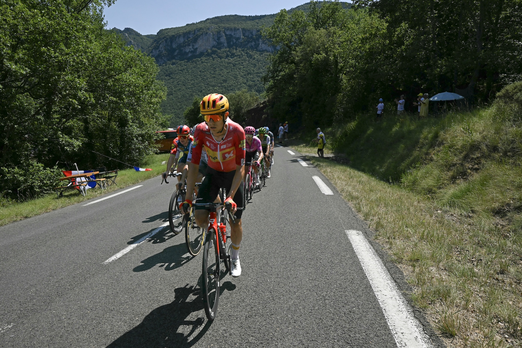Uno-X Mobility team's Norwegian rider Torstein Tr&aelig;en leads the chasing group during the 4th stage of the 113th edition of the Tour de France cycling race, 181,9 km between Carcassonne and Foix in southwestern France, on July 7, 2026. (Photo by Loic VENANCE / AFP)