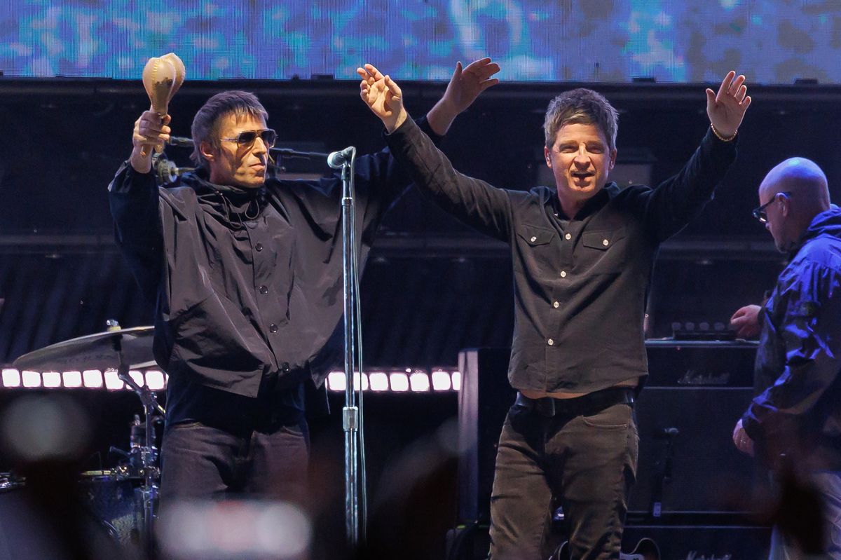 Liam Gallagher, Noel Gallagher of Oasis perform onstage at the Oasis Live '25 World Tour held at the Rose Bowl on September 07, 2025 in Pasadena, California. (Photo by Rich Polk/Variety via Getty Images)