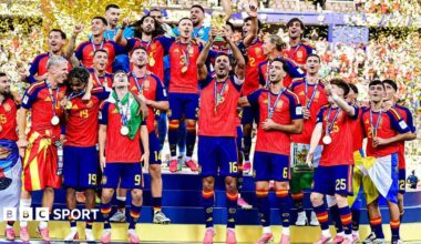 Spain lift the World Cup trophy