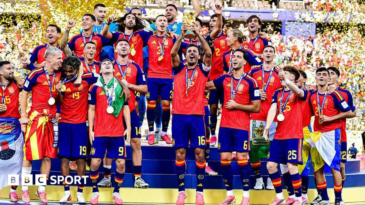 Spain lift the World Cup trophy