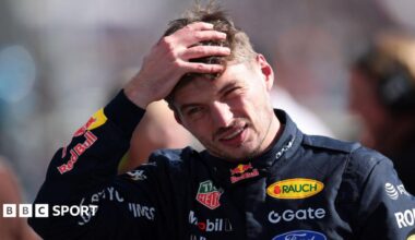 Red Bull's Max Verstappen runs his hands through his hair