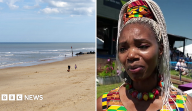 Anna Mudeka is pictured on the right wearing a beaded necklace and a colourful vest while at an event. On the left, Waxham beach can be seen, with a couple walking along the stretch of sand as waves roll onto it on a sunny day.