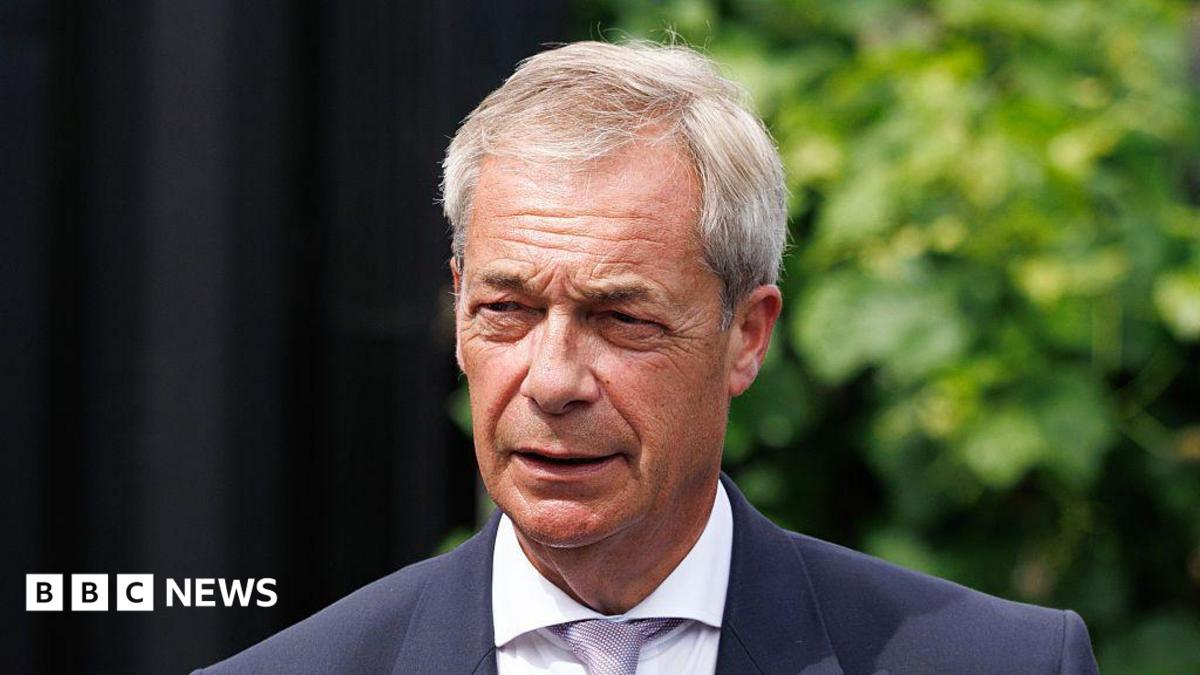 Nigel Farage wearing a suit and tie.
