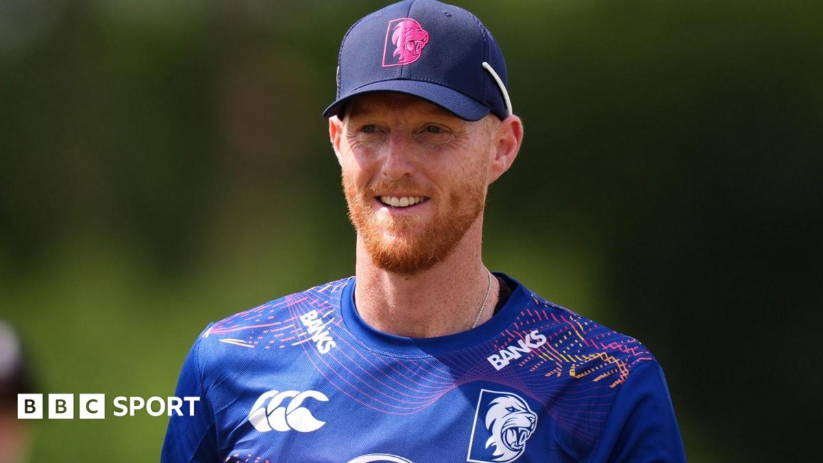 Ben Stokes holds his bat out in celebration as he hits a century against Derbyshire