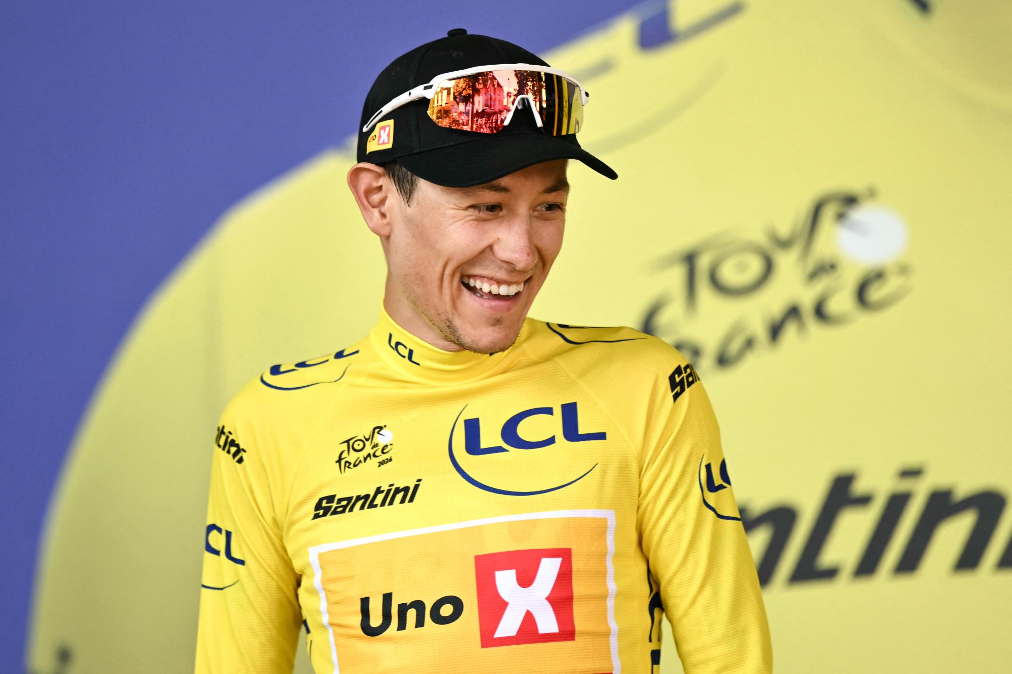 Torstein Tr&aelig;en smiles in the yellow jersey