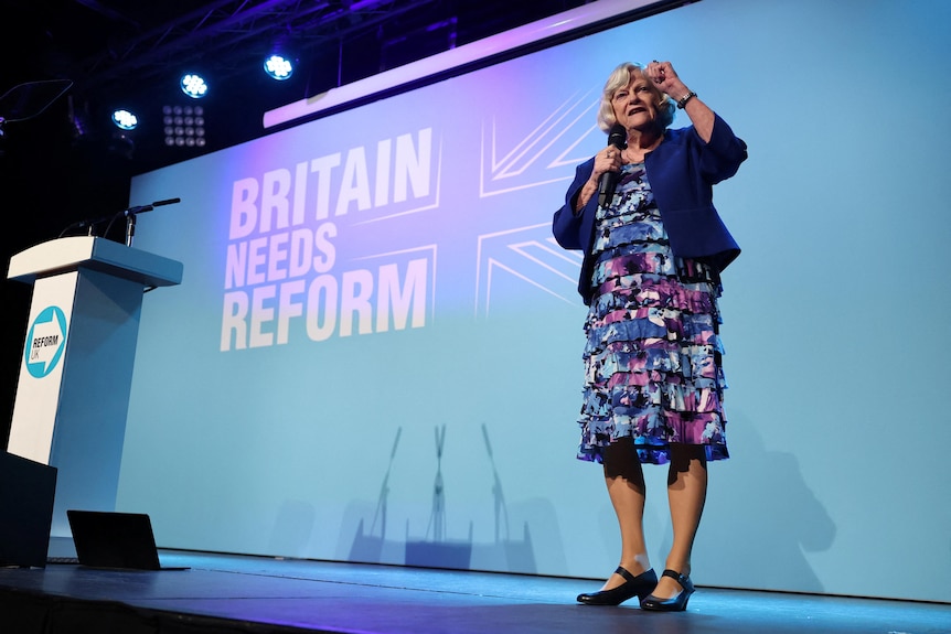 A politician speaks on stage.