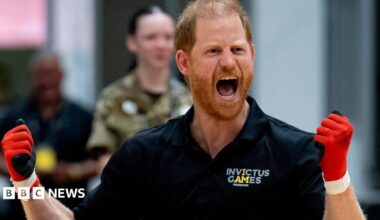 Prince Harry wearing gloves as as he played wheelchair rugby at an event in Birmingham for the Invictus Games