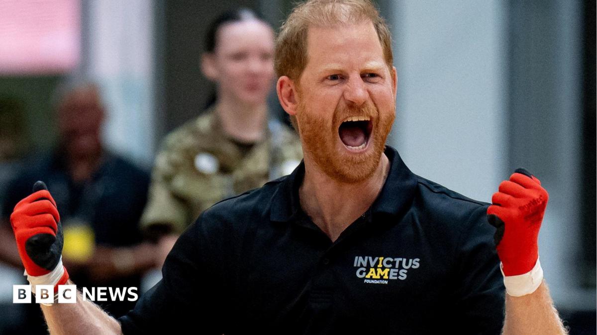 Prince Harry wearing gloves as as he played wheelchair rugby at an event in Birmingham for the Invictus Games