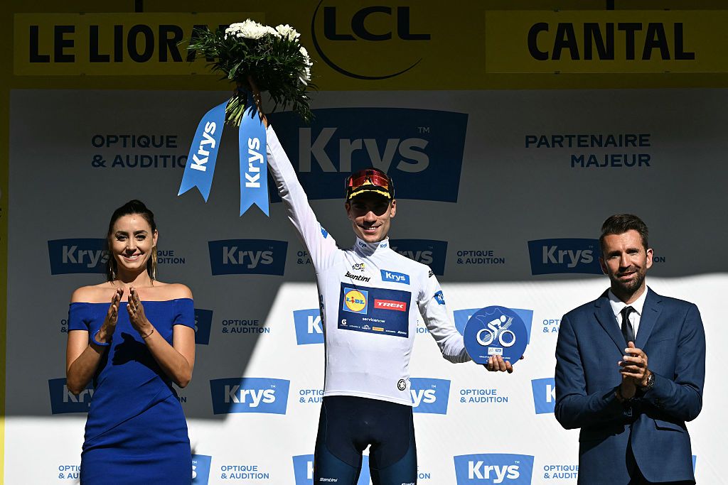 Juan Ayuso celebrates on the podium with the best young rider's white jersey after the 10th stage of the 113th edition of the Tour de France