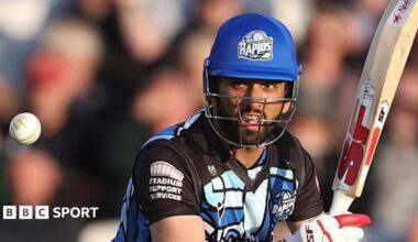 Sikandar Raza watches the ball fly away after playing a shot while batting for Worcestershire in a T20 game