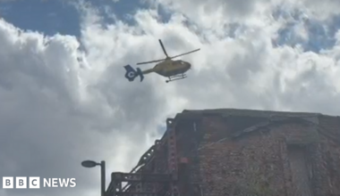 A helicopter in the sky above the Northern Quarter in Manchester city centre.
