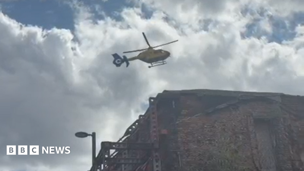 A helicopter in the sky above the Northern Quarter in Manchester city centre.
