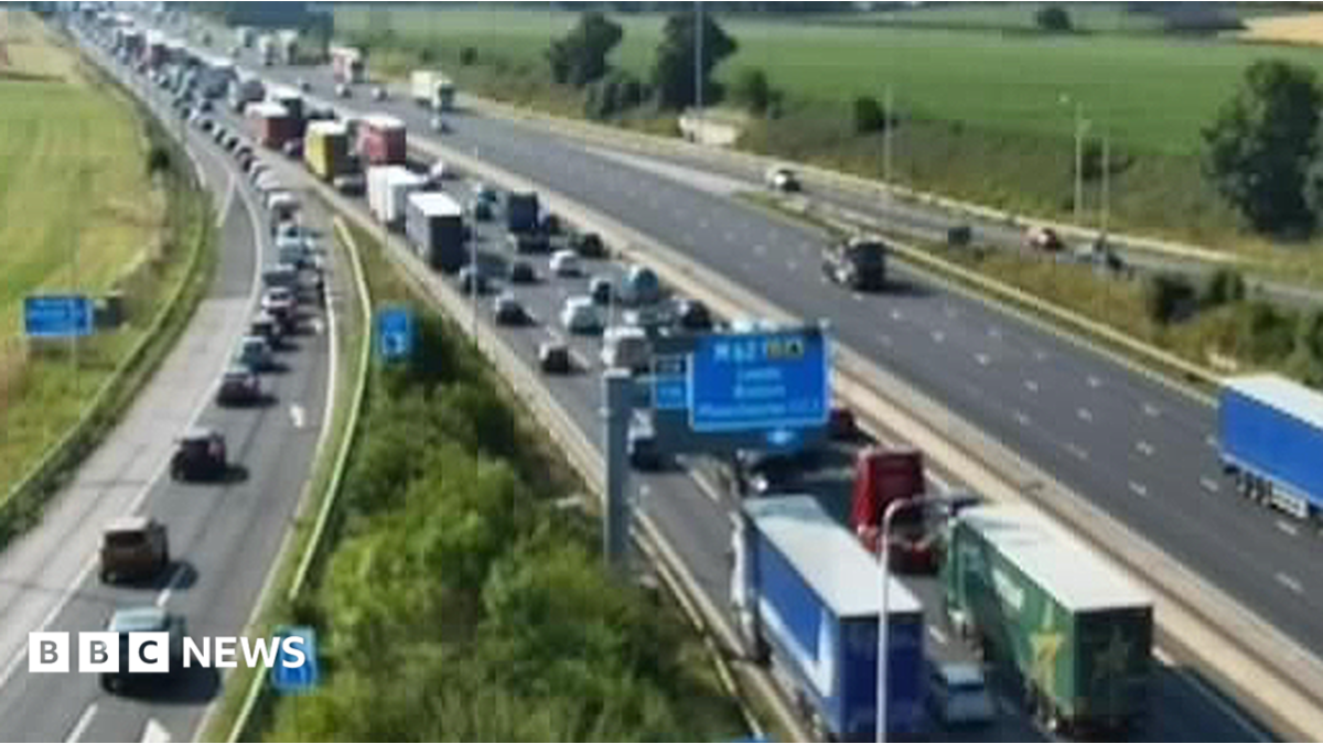 CCTV cameras capture traffic congestion on the M6 motorway in Warrington, Cheshire.
